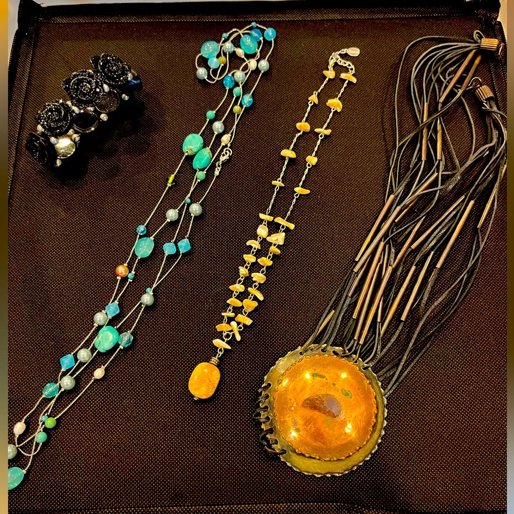 Costume jewelry 
3 necklaces and one bracelet
